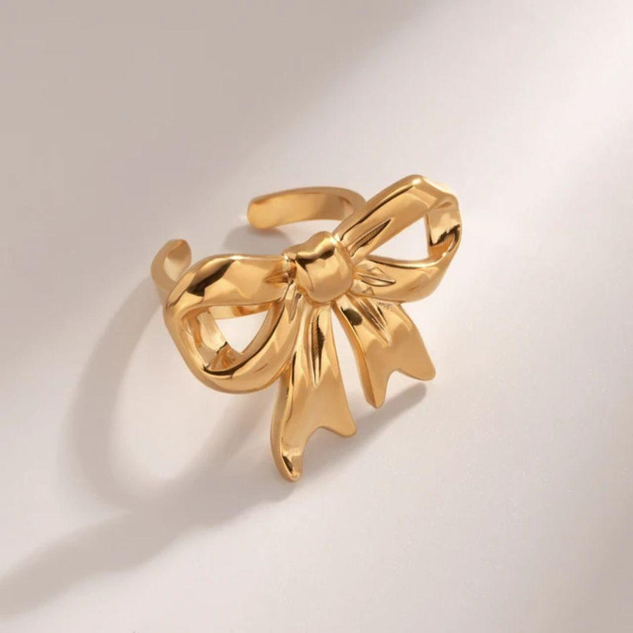 As pretty golden bow ring