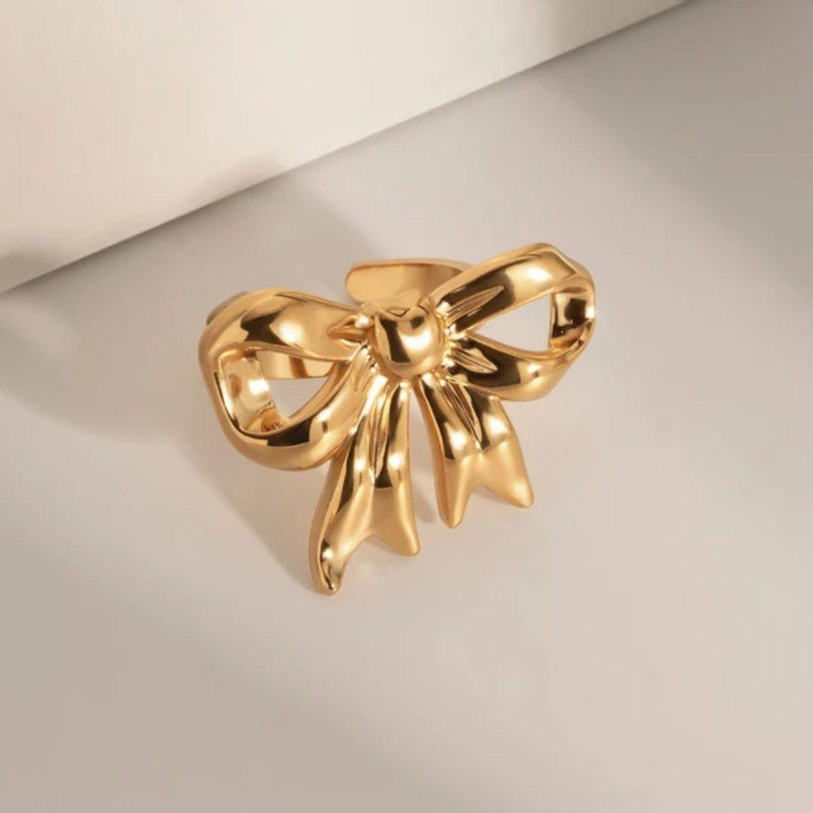 As pretty golden bow ring